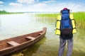 Male tourist looks at the lake