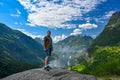 Male tourist standing high near Giranger in Norway Royalty Free Stock Photo