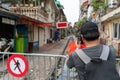 Male tourist taking photo of Hanoi railway next to the