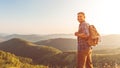 Male tourist on top of mountain in fog in autumn Royalty Free Stock Photo