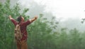 Male tourist on top of mountain in fog in autumn Royalty Free Stock Photo