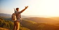 Male tourist on top of mountain in fog in autumn Royalty Free Stock Photo