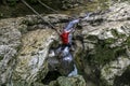 A male traveler admires the canyon of the Agura River in Sochi