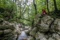 A male traveler admires the canyon of the Agura River in Sochi Royalty Free Stock Photo