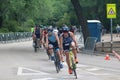 Male triathletes on bikes