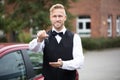 Male Valet Holding Car Keys Royalty Free Stock Photo