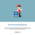 Male valet standing beside sign Royalty Free Stock Photo