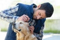male vet checking dogs ears