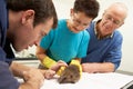 Male Veterinary Surgeon Examining Rescued Hedgehog