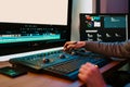 Male Video Editor Working on His Personal Computer with Big blank Display Royalty Free Stock Photo