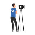 Male Video Operator Looking Through Professional Camcorder on Tripod, Television Industry Concept Cartoon Style Vector