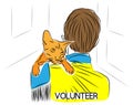 Male volunteer is cuddling rescued stray cat. Sick street cat sits on shoulder of volunteer, an animal shelter worker