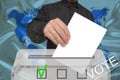 Male voter drops a blank ballot in a transparent ballot box, concept of state elections, referendum