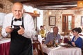 Waiter demonstrating his upset