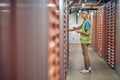 Male warehouse worker checking garage lock