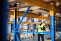 Male warehouse worker with tablet. Royalty Free Stock Photo