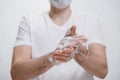 Male washing hands as anti-coronavirus protection