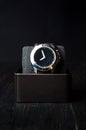 Male watch in a box on dark background Royalty Free Stock Photo