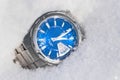 The Male watch on snow.