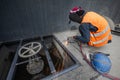 Male welder is welding new steel grate, arc welding process with sparks. Industrial worker concept. Long exposure Royalty Free Stock Photo