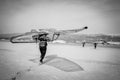 Windsurfer Carrying Board in Tarifa, Andalucia, Spain