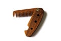 Male wooden comb for beard and hair isolated on a white background