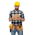 Male worker or builder in helmet with clipboard Royalty Free Stock Photo