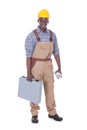 Male worker carrying toolbox