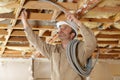 male worker checking ceiling pipes Royalty Free Stock Photo