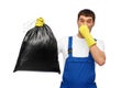 male worker or cleaner with stinky garbage bag