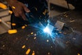 Male worker hand welding steel