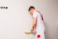 Male worker is preparing to paint the wall Royalty Free Stock Photo