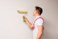 Male worker is preparing to paint the wall Royalty Free Stock Photo