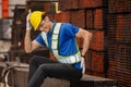 Male worker suffer from back pain from heavy steel factory work Royalty Free Stock Photo