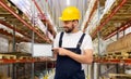 Male worker with tablet computer at warehouse Royalty Free Stock Photo