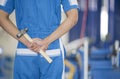 Male worker with tools in back pocket