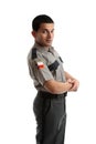 Male worker in uniform standing sideways