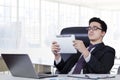 Male worker using tablet in office room Royalty Free Stock Photo