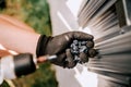 male worker working screws and electric screwdriver on the construction site Royalty Free Stock Photo