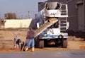 Male Workers Pouring Cement Royalty Free Stock Photo