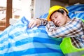 Male workers working on building construction He took a nap after lunch. Royalty Free Stock Photo