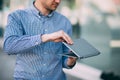 Male working on laptop on street