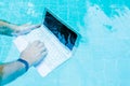 Male works on minicomputer under water. Minicomputer at the bottom of the pool. The concept of a lot of work at work Royalty Free Stock Photo