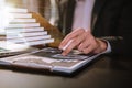 Male writes information businessman working on laptop computer writing business plan while sitting. Royalty Free Stock Photo