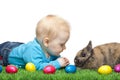 Male young Baby in meadow with Easter bunny