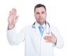 Male young doctor swearing or having the Hippocratic oath