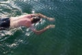 Male young swimmer underwater - sea, swimming lessons, diving Royalty Free Stock Photo