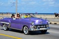 Malecon in Havana with typical American car, Cuba