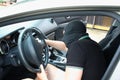 The malefactor in the mask stealing car