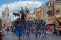 Maleficient dragon and characters in Disney Festival of Fantasy Parade at Magic Kigndom 3.